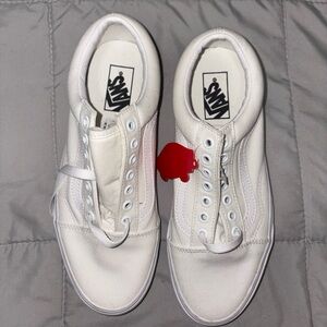 New white platform lace-up Vans.